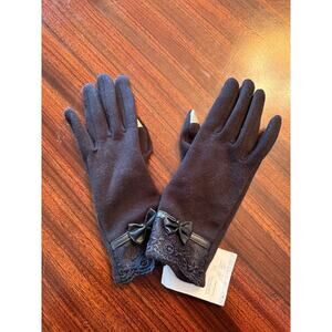 Black touchscreen compatible gloves with lace detail and faux leather bow. NWT